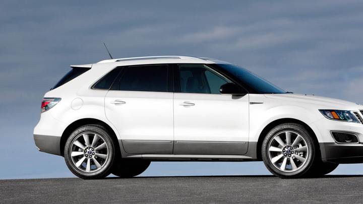 Side Pose Of 2011 Saab 9-4X In White